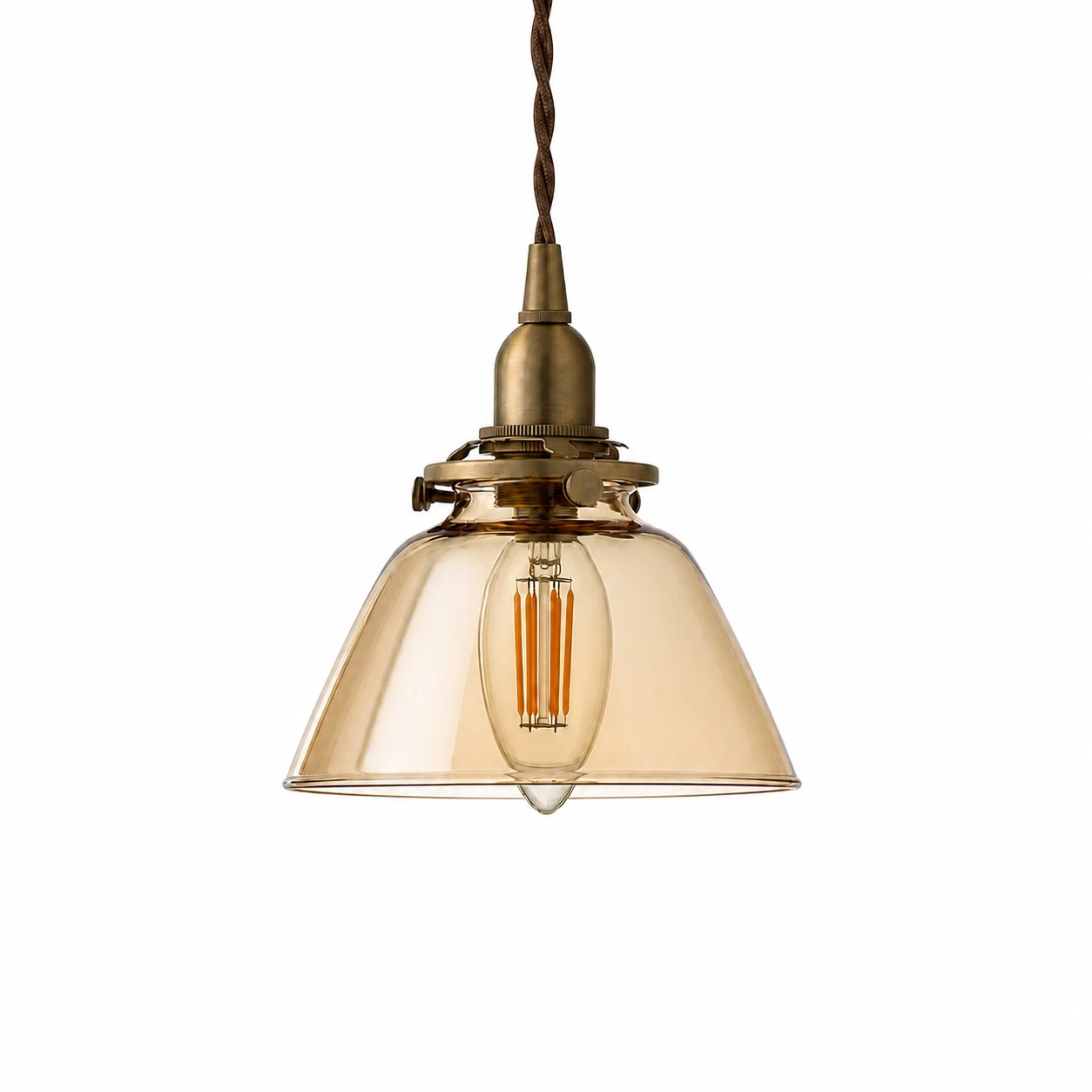 Amber smooth glass pendant light with brass-toned holder
