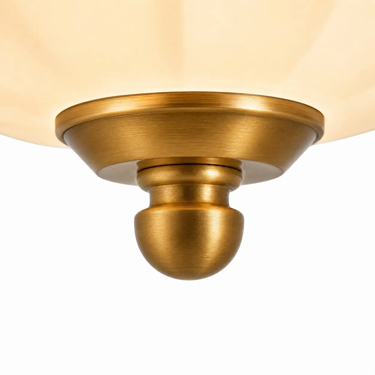 Brass lower finial detail