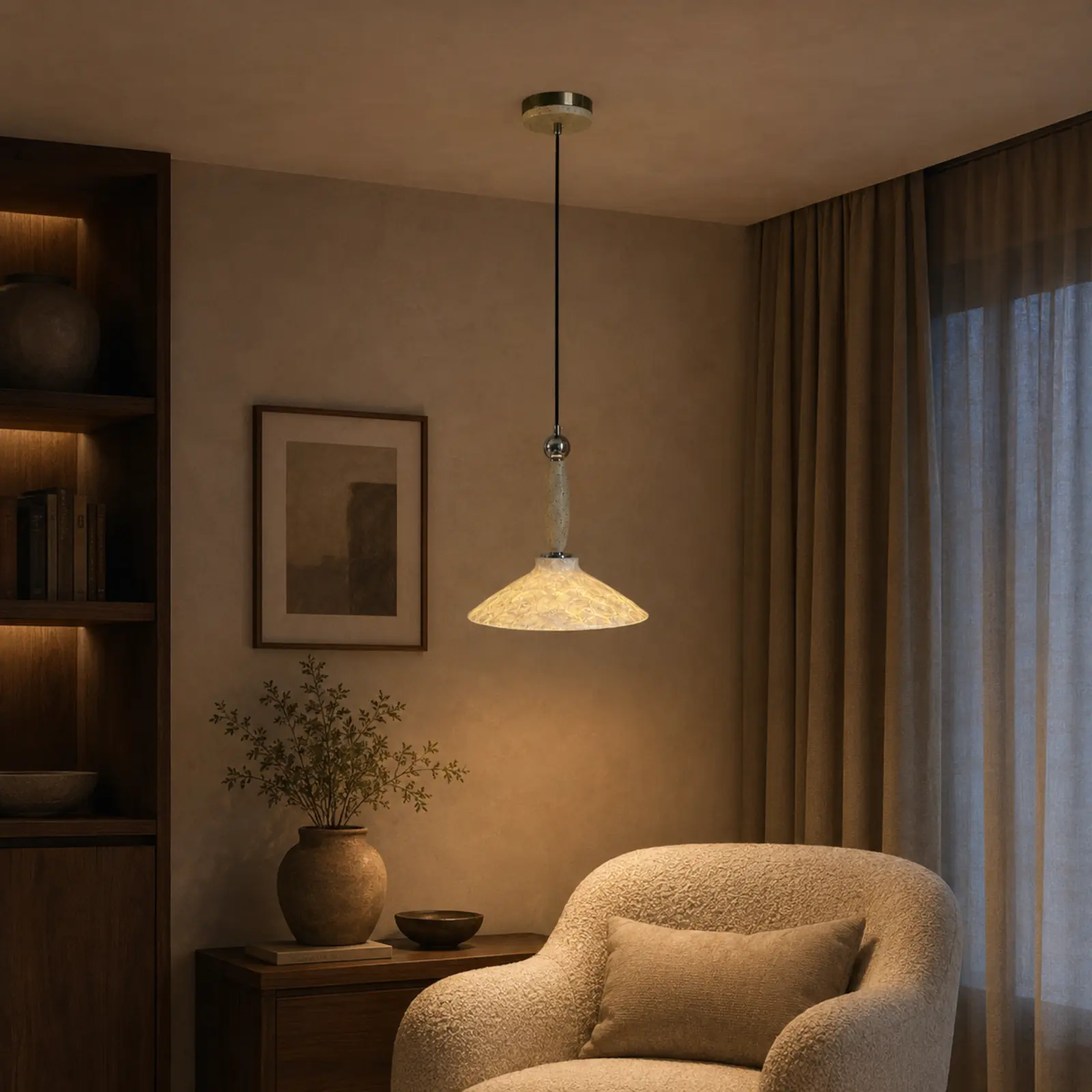 Warm mother-of-pearl pendant light in a boutique reading nook