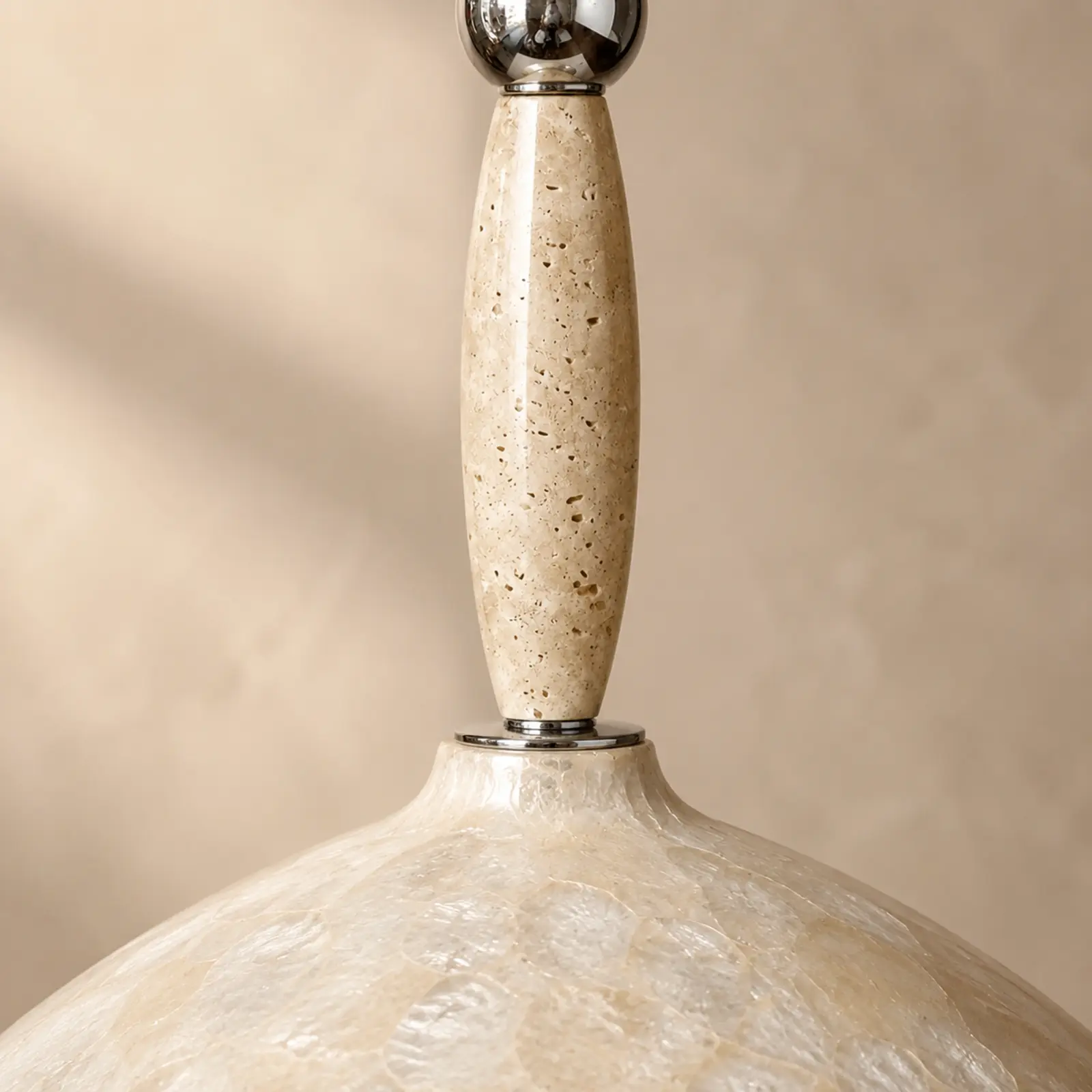 Travertine stem connected to the mother-of-pearl shade