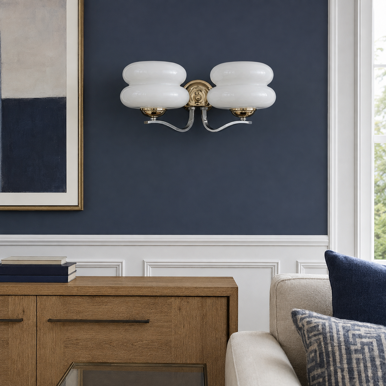 Cream white two-light wall sconce in a modern American living room