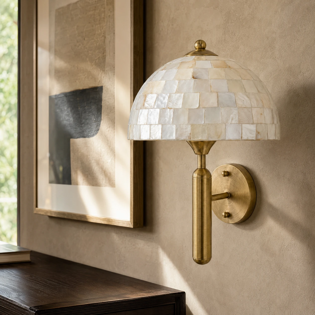 Mother-of-pearl wall sconce showing its shell mosaic in daylight