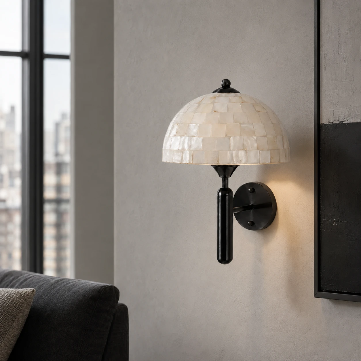 Black mother-of-pearl wall sconce in a modern apartment